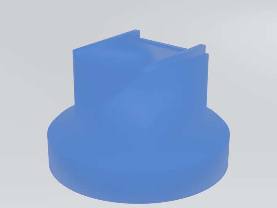 Render of a round blue 3D-printed base with a tall rectangular dock block rising from its edge and a slot in the top